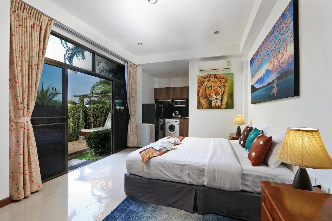 Appartement Palm Oasis à Nai Harn Extérieur photo