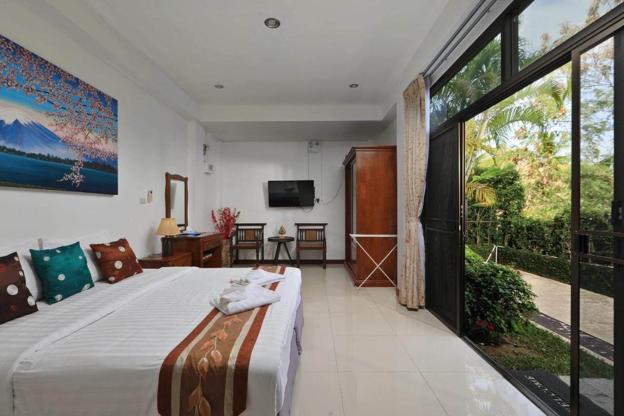 Appartement Palm Oasis à Nai Harn Extérieur photo